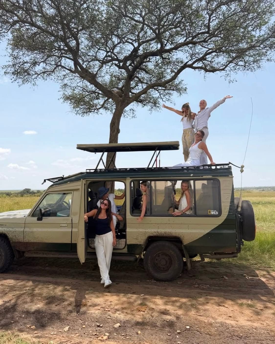 Group on safari jeep